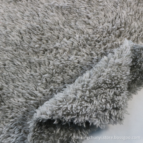 100Polyester Anpassad färg Mjuk handkänslan Weft Sticked Cationic Dye Sherpa Fleece Tyg för sängkläder filtplagg